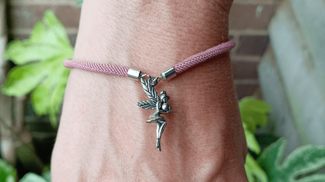 Dusky Pink kids bracelet with a Fairy Charm